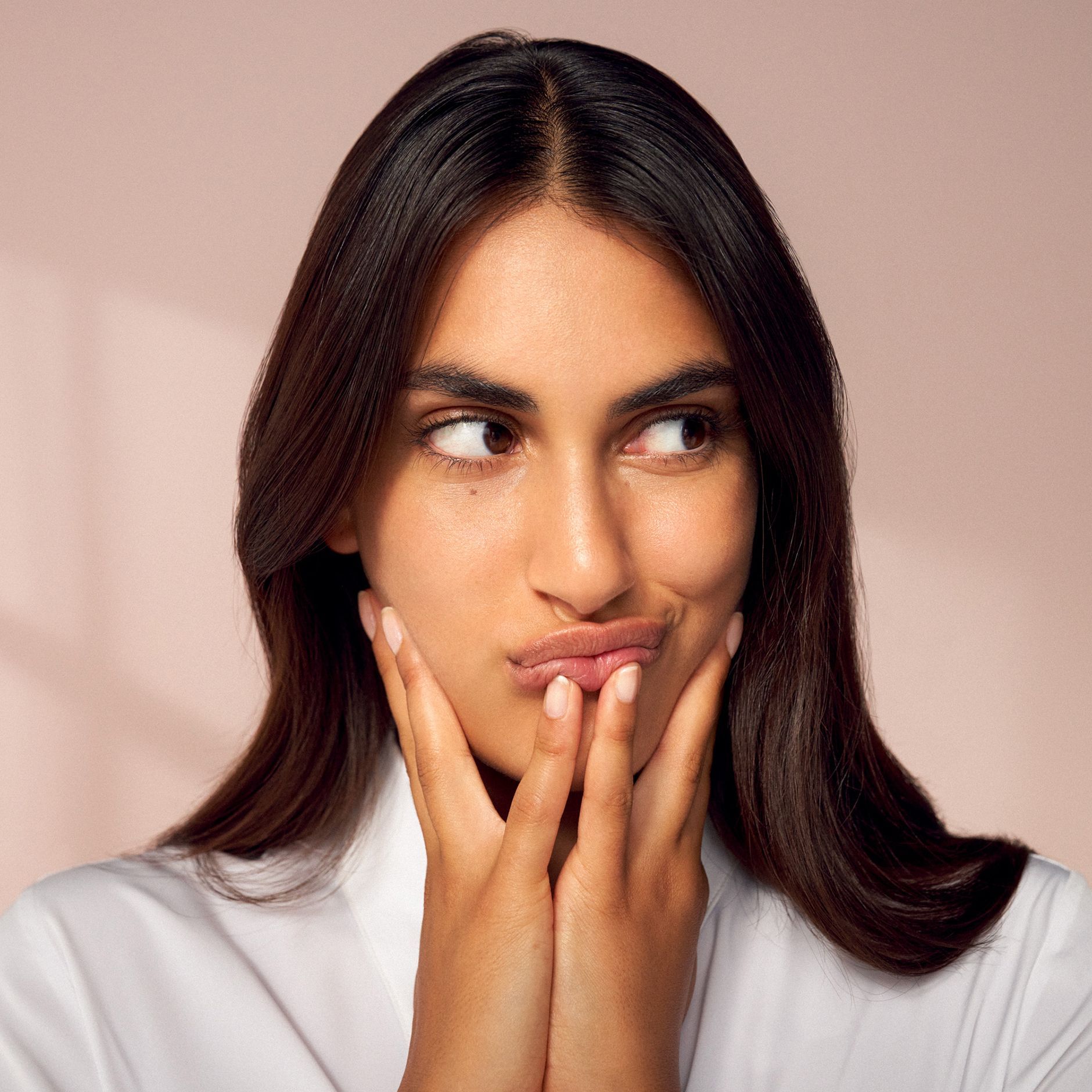 Brown hair woman thinking 